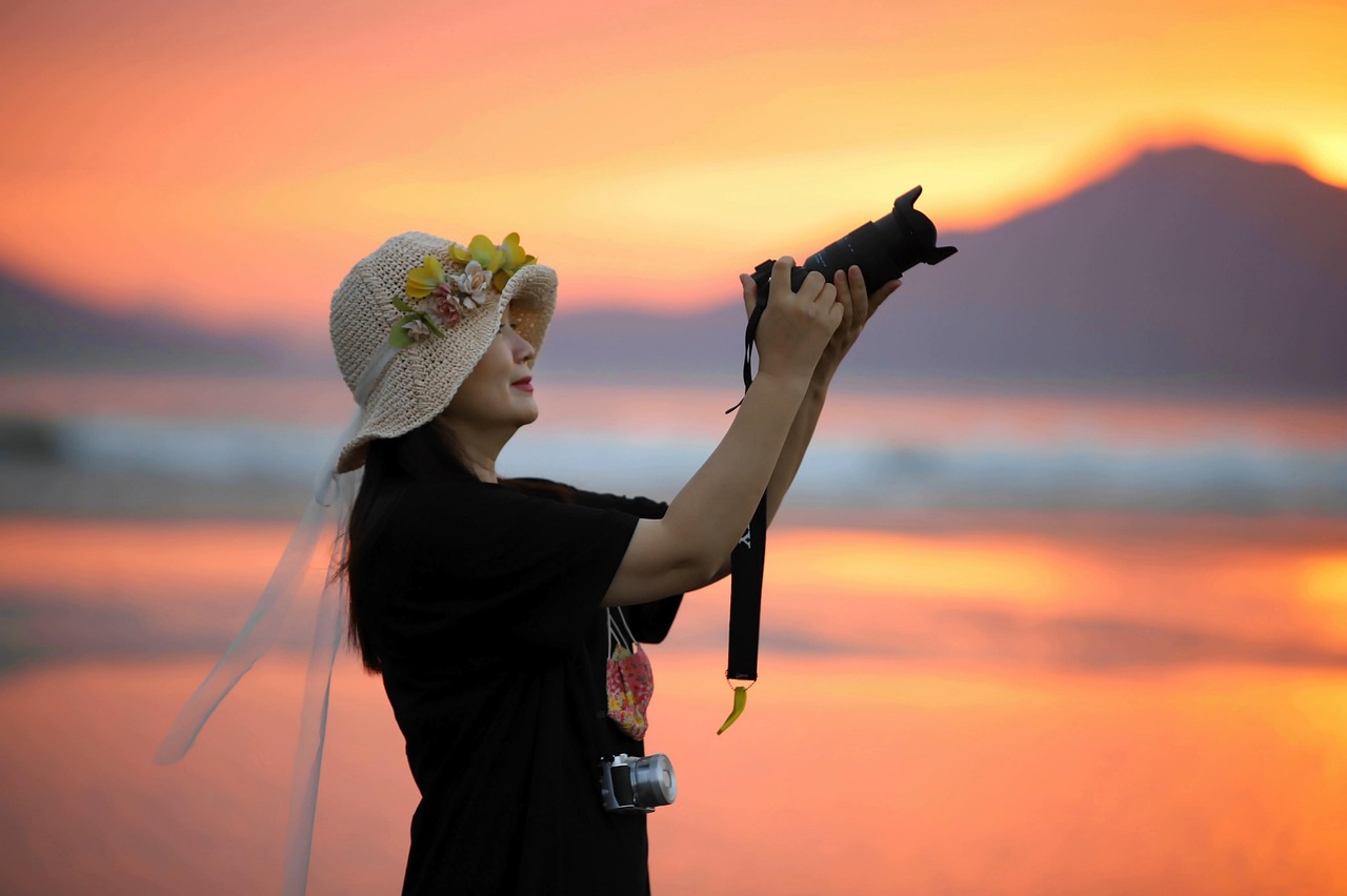Golden sunset over the wide shallow sands of Dadaepo Beach at the mouth of the Nakdong River in Saha-gu, Busan