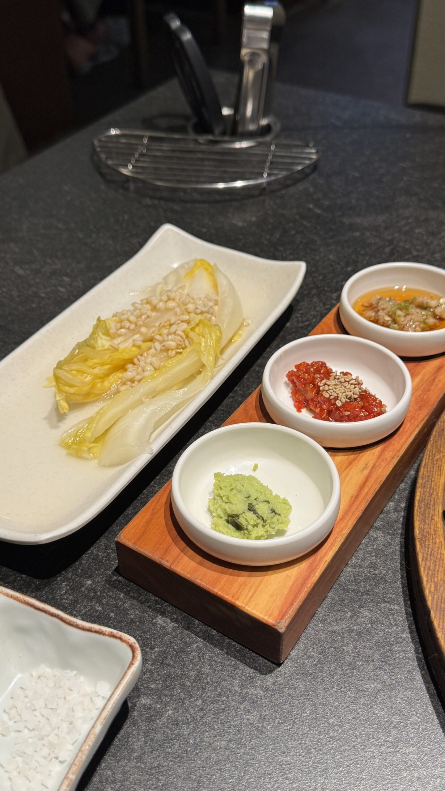 Side dishes and dipping sauces at Gilchon Busan