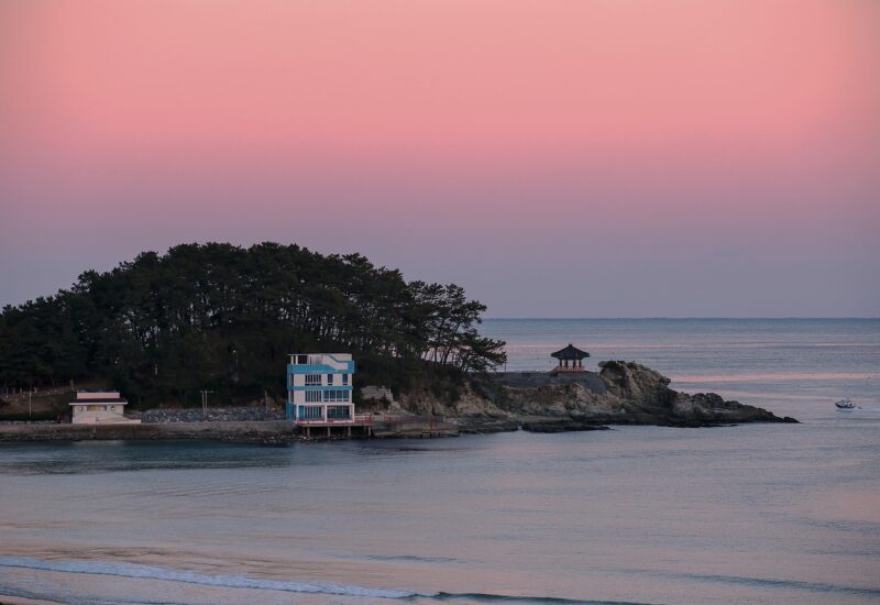 Songjeong Beach in Busan, a wide sandy crescent popular with surfers in Haeundae-gu